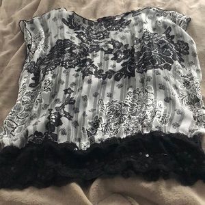 Dressy top with sequins waistband